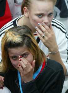 GERMAN SOCCER FANS WIPE TEARS IN BERLIN AFTER BRAZIL BEAT GERMANY IN WORLD CUP FINALS
